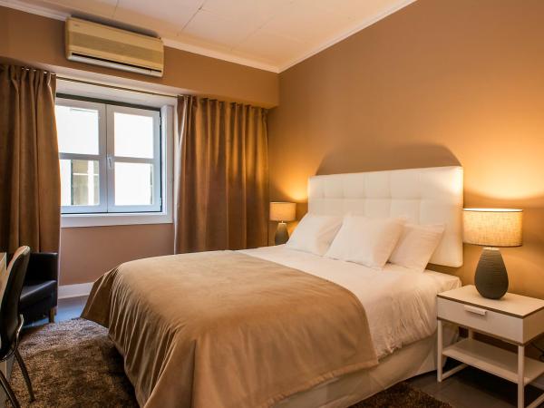PH Downtown Suites : photo 7 de la chambre suite deluxe avec lit king-size