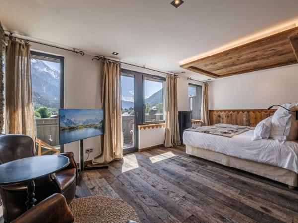 Chalet-Hôtel Hermitage : photo 4 de la chambre suite confortable avec accès au spa