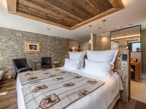 Chalet-Hôtel Hermitage : photo 7 de la chambre suite confortable avec accès au spa