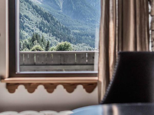 Chalet-Hôtel Hermitage : photo 5 de la chambre suite confortable avec accès au spa