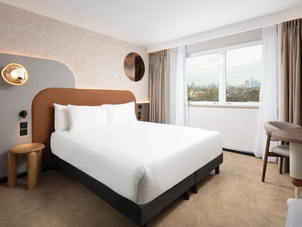 Mercure London Earls Court : photo 1 de la chambre superior king room with bath tub and city view