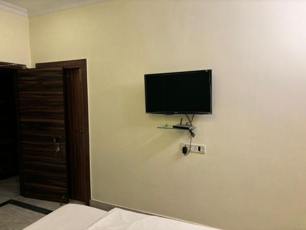 Om Sai Villa Guesthouse : photo 6 de la chambre chambre double deluxe avec balcon