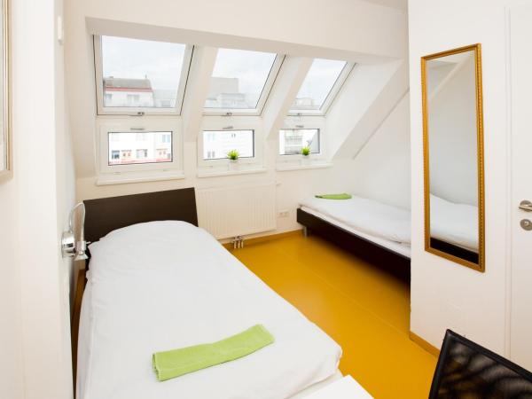 A&T Hotel & Hostel : photo 1 de la chambre chambre lits jumeaux