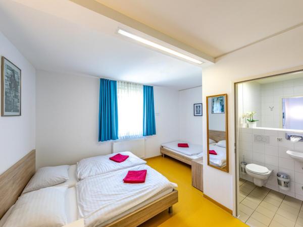 A&T Hotel & Hostel : photo 5 de la chambre chambre triple