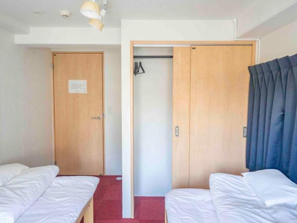 GuestHouse Hostel MangeTak ゲストハウス マングタック広島 : photo 2 de la chambre chambre lits jumeaux standard