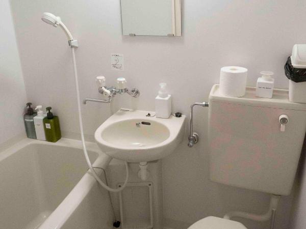 GuestHouse Hostel MangeTak ゲストハウス マングタック広島 : photo 3 de la chambre chambre lits jumeaux standard