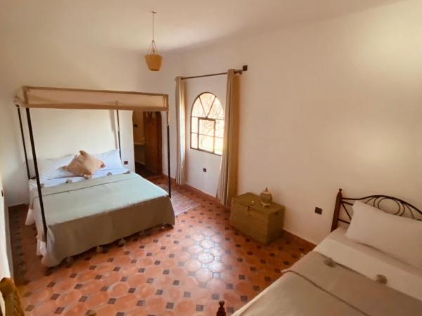 Villa Apollonia - Blissful Garden Paradise with Pool nestled in Nature : photo 3 de la chambre chambre triple - vue sur jardin