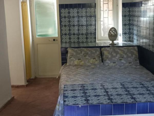 Il giardino nascosto : photo 6 de la chambre grande chambre double