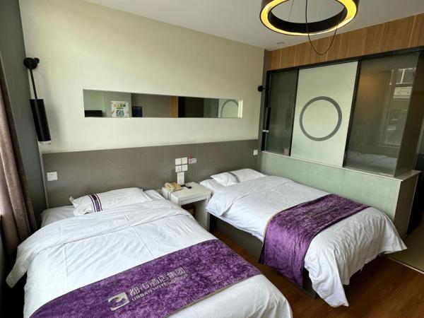 都市118酒店广电大厦店 : photo 1 de la chambre chambre lits jumeaux deluxe