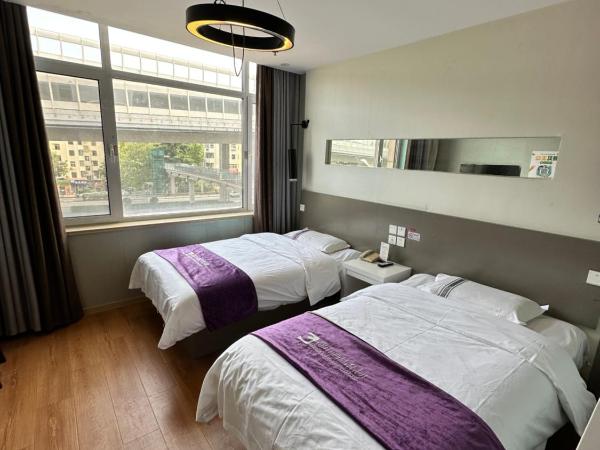 都市118酒店广电大厦店 : photo 4 de la chambre chambre lits jumeaux deluxe
