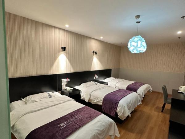 都市118酒店广电大厦店 : photo 2 de la chambre chambre triple standard