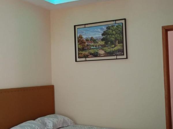 Naemy Suite's : photo 6 de la chambre suite - vue sur jardin