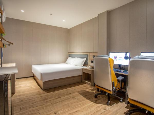 网鱼电竞酒店上海新国际博览中心店 : photo 2 de la chambre chambre double