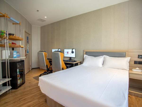 网鱼电竞酒店上海新国际博览中心店 : photo 4 de la chambre chambre double