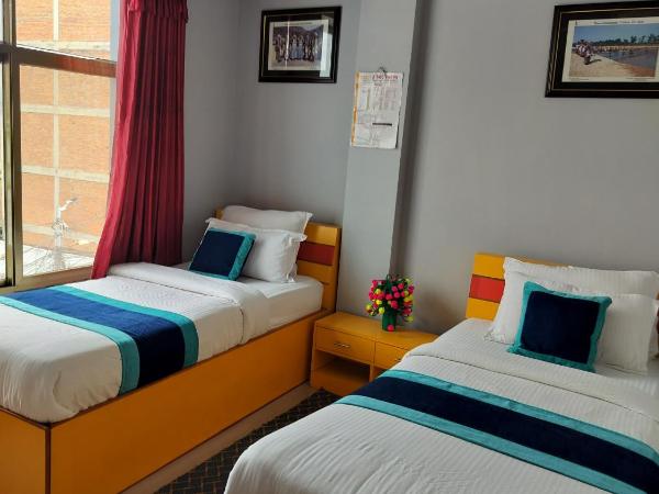 Three Brothers Apartment and Hotel : photo 1 de la chambre chambre lits jumeaux deluxe