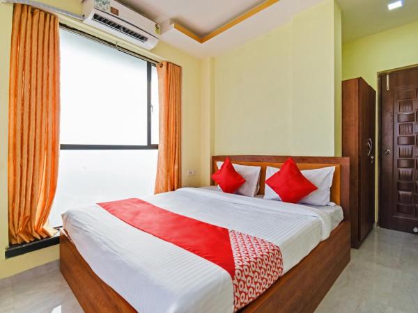 OYO 74825 Om Shanti Palace : photo 1 de la chambre chambre triple classique