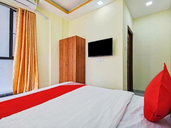 OYO 74825 Om Shanti Palace : photo 3 de la chambre chambre triple classique