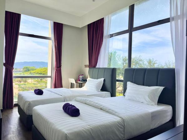 New Margo Hotel KK : photo 3 de la chambre chambre lits jumeaux standard