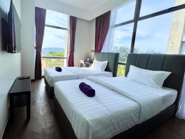 New Margo Hotel KK : photo 7 de la chambre chambre lits jumeaux standard