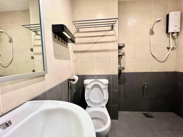 New Margo Hotel KK : photo 10 de la chambre chambre lits jumeaux