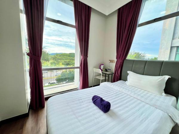 New Margo Hotel KK : photo 5 de la chambre chambre lits jumeaux standard