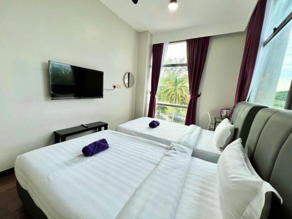 New Margo Hotel KK : photo 6 de la chambre chambre lits jumeaux standard