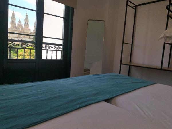 Hotel Pombal Rooms : photo 7 de la chambre chambre double ou lits jumeaux - vue sur ville