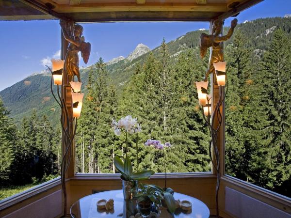 Hôtel Les Chalets de Philippe avec Jacuzzis Privatifs : photo 5 de la chambre suite avec jacuzzi