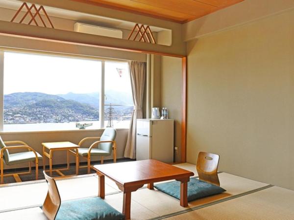 Ooedo Onsen Monogatari Nagasaki Hotel Seifu : photo 1 de la chambre standard japanese-style room - city night view - private bathroom - non-smoking