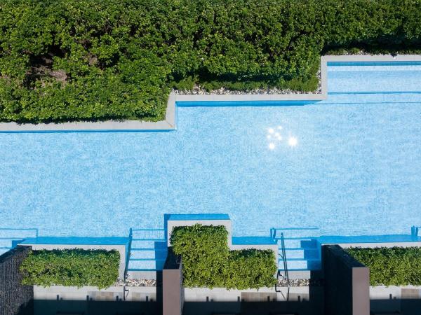 1 Hotel Haitang Bay, Sanya : photo 2 de la chambre hébergement lits jumeaux avec petite piscine lagoon