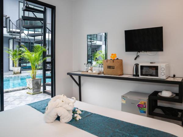 Chanakarn Pool Access Rawai : photo 9 de la chambre chambre double ou lits jumeaux avec accès piscine