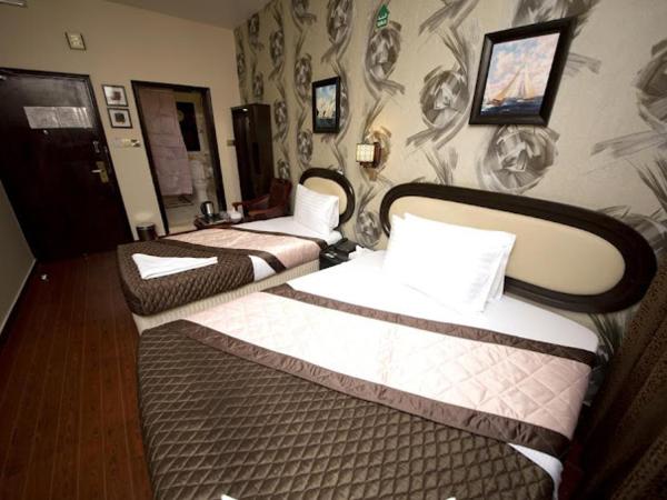 Grand Sina Hotel : photo 2 de la chambre chambre triple