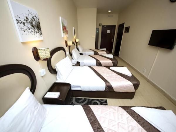 Grand Sina Hotel : photo 2 de la chambre chambre quadruple