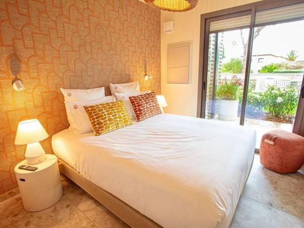 Hôtel La Ménado : photo 2 de la chambre suite familiale