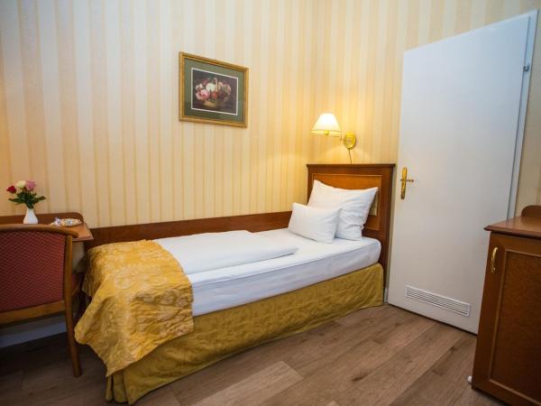 Pension Opera Suites I Self Check In : photo 5 de la chambre petite chambre simple