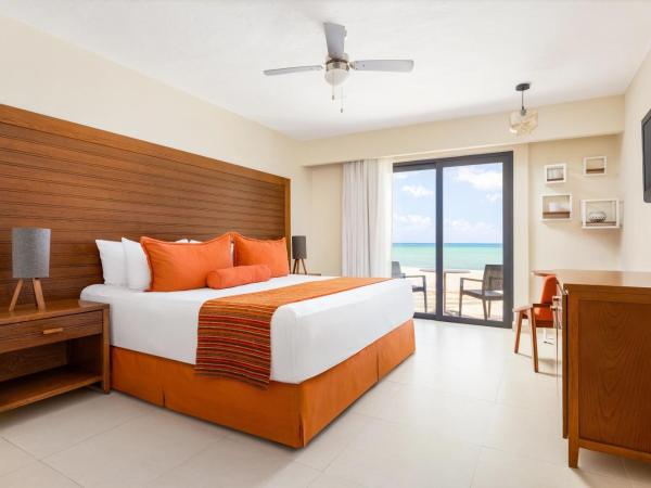 Sunscape Sabor Cozumel : photo 6 de la chambre hébergement lit king-size de luxe – côté océan
