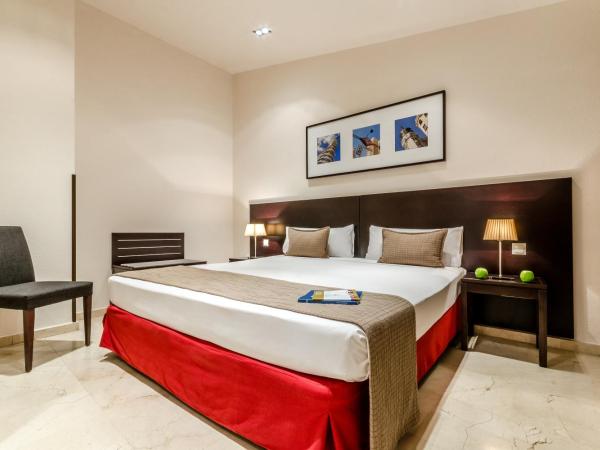 Exe Suites 33 : photo 1 de la chambre chambre double ou lits jumeaux