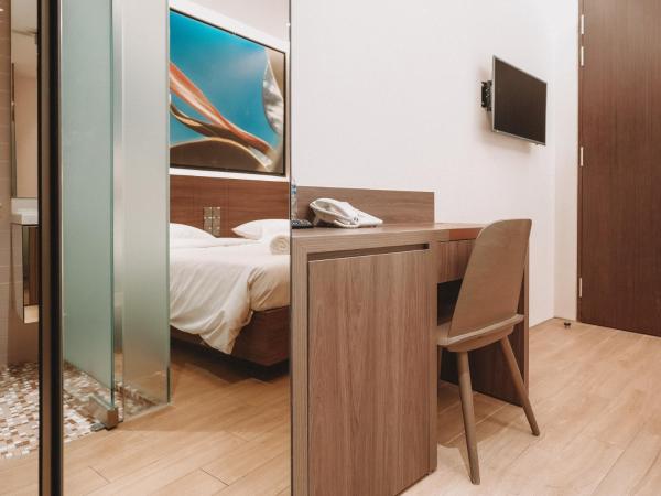 L Hotel at Bugis Ville : photo 3 de la chambre deluxe twin, no window