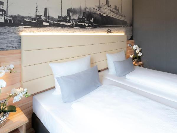 PLAZA Premium Columbus Bremen : photo 3 de la chambre chambre familiale