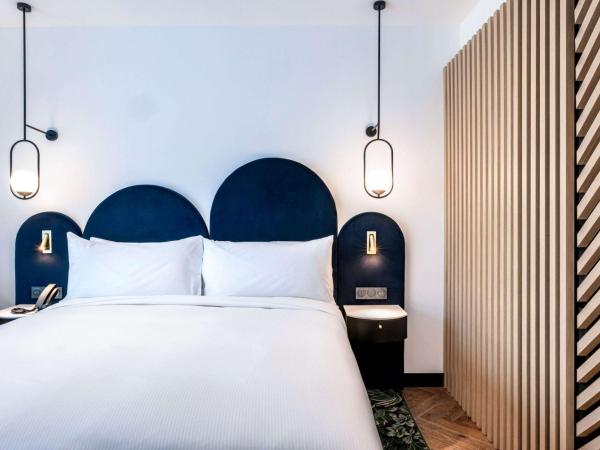 Doubletree By Hilton Nice Centre Iconic : photo 1 de la chambre chambre lit king-size
