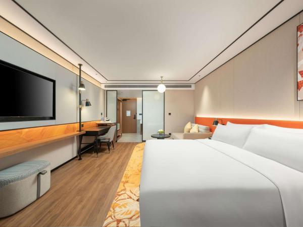 Hilton Garden Inn Tianjin Railway Station : photo 2 de la chambre chambre lit king-size deluxe