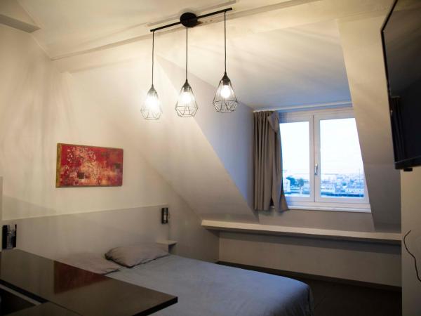 Smartappart Cherbourg (la rose des vents) : photo 2 de la chambre appartement supérieur