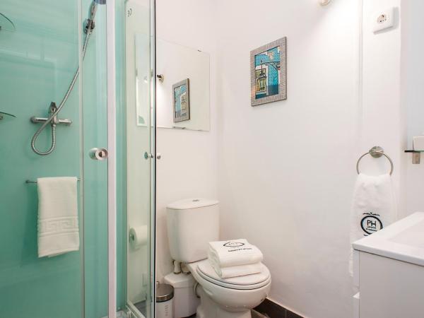 PH Downtown Suites : photo 8 de la chambre petite chambre double