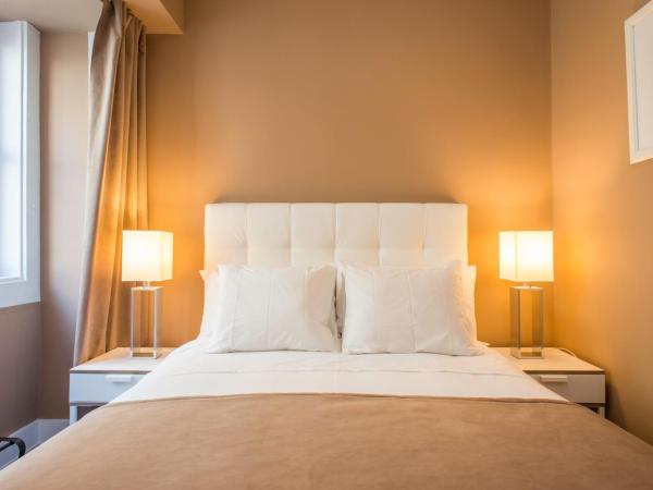 PH Downtown Suites : photo 7 de la chambre petite chambre double