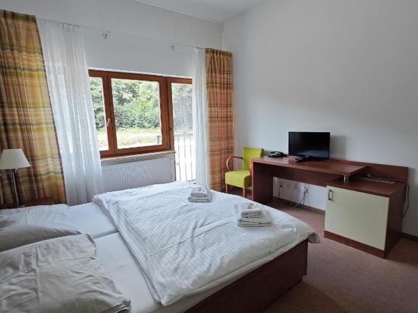 Geyserpark Village : photo 6 de la chambre chambre double ou lits jumeaux - vue sur jardin
