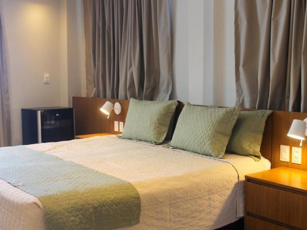 Farol de Itapuã Praia Hotel : photo 7 de la chambre suite avec baignoire spa