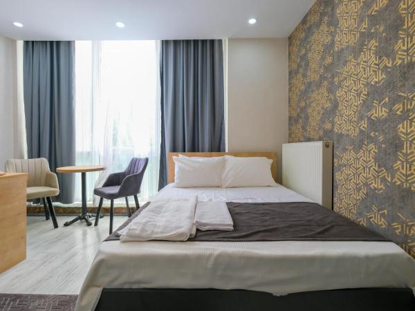 Minimalist Suit Otel : photo 3 de la chambre chambre double deluxe