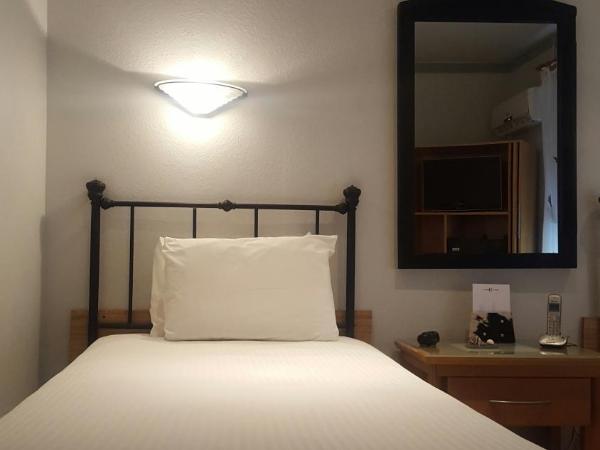 Cadet Hotel : photo 4 de la chambre chambre standard avec 2 lits jumeaux
