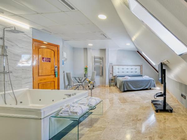 Caballero Errante : photo 5 de la chambre chambre lit queen-size avec baignoire spa