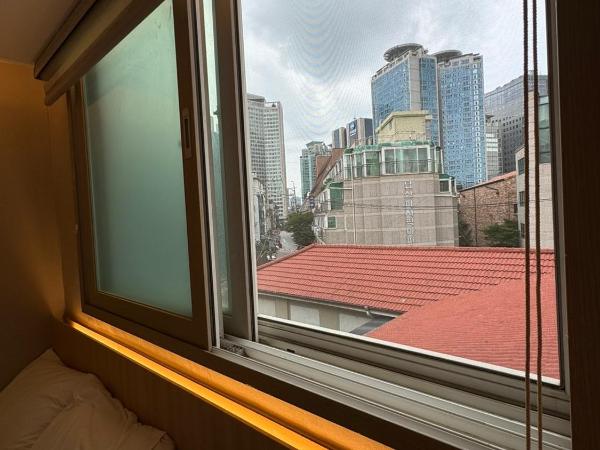 Well Plus Guest House : photo 3 de la chambre chambre triple - vue sur ville